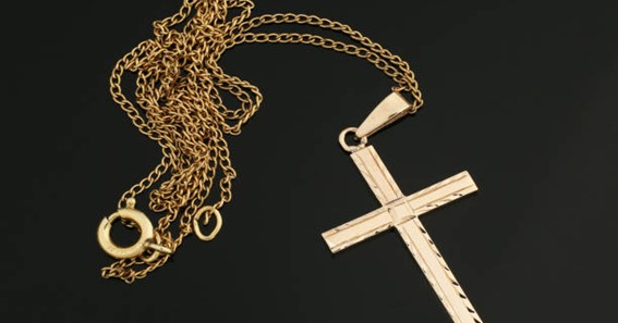 Wear a Symbol of Faith Through a Gold Cross Pendant